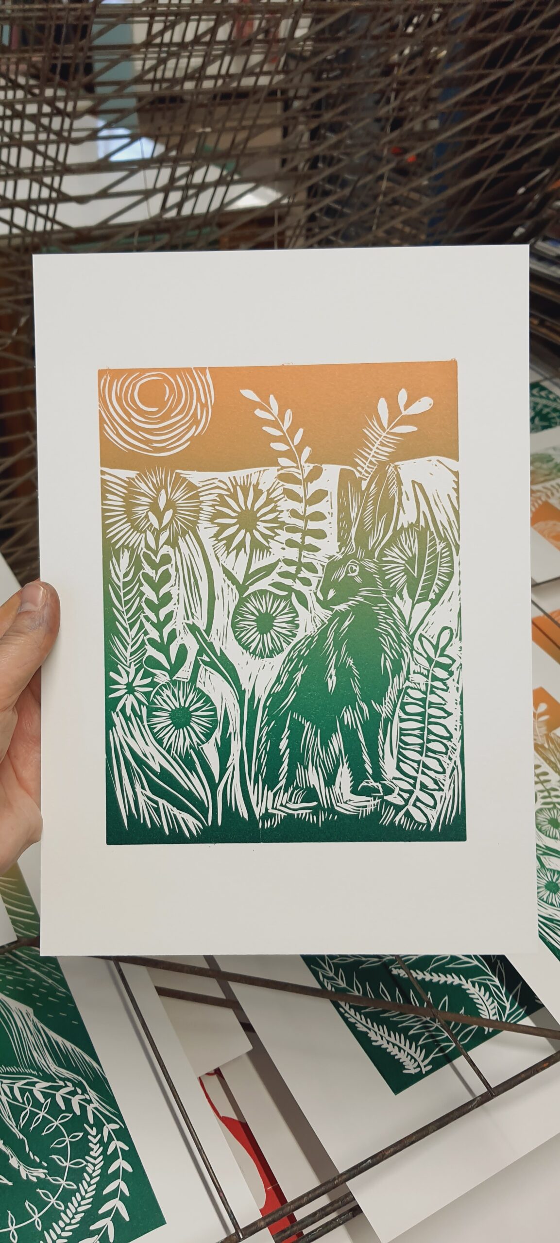 Image of a Linoprint rabbits in a field