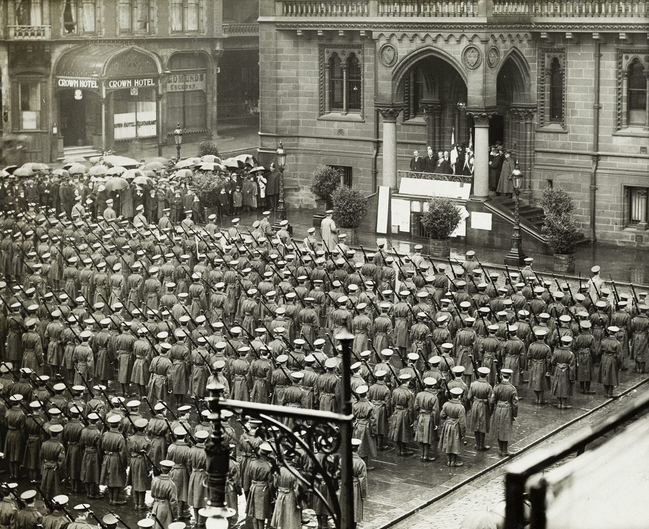 A black and white photo of soldiers standing in rows.