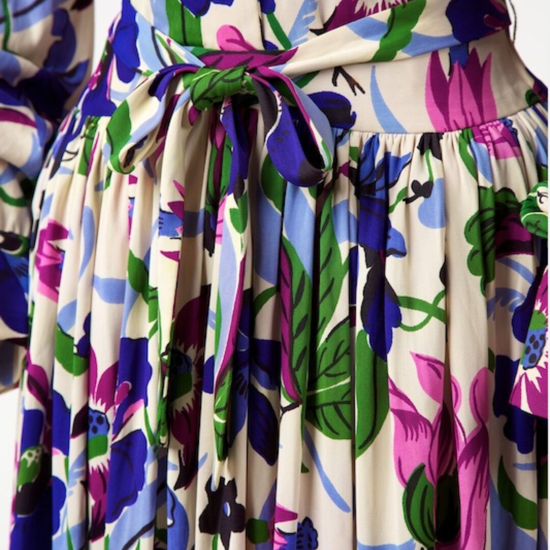 A cream, purple, blue and green patterned dress.