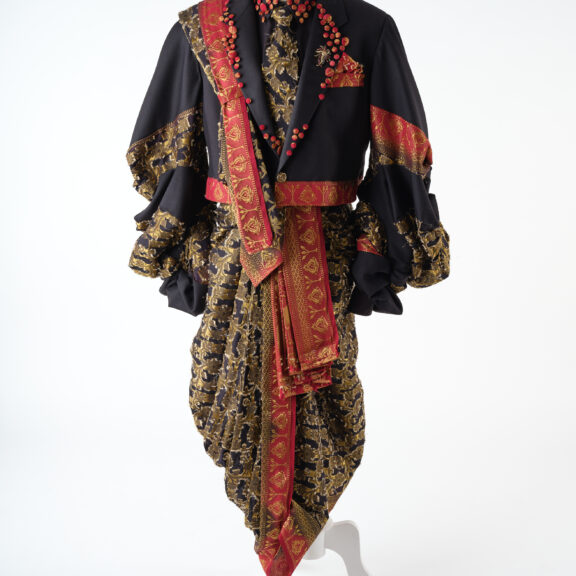 Image of a red and black saree suit