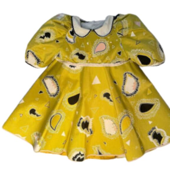 An image of a babydoll style yellow dress.