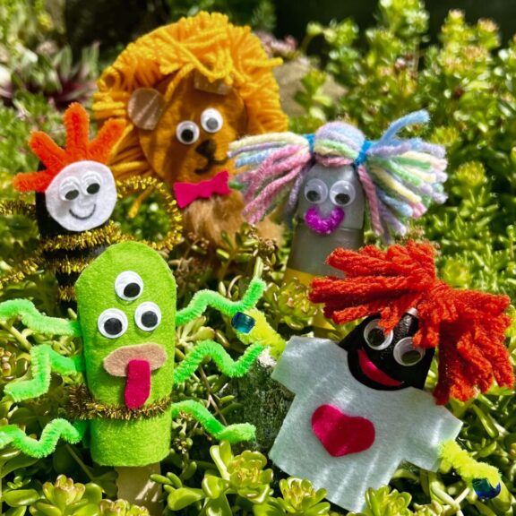 An assortment of colourful finger puppets.