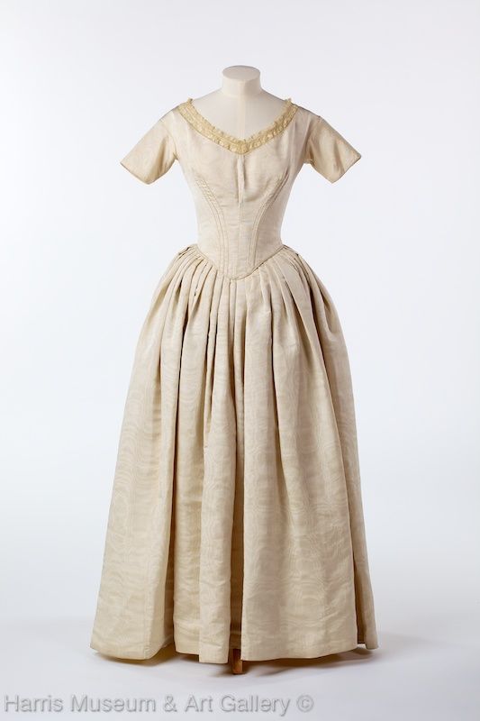 Dress made from ivory moiré taffeta.