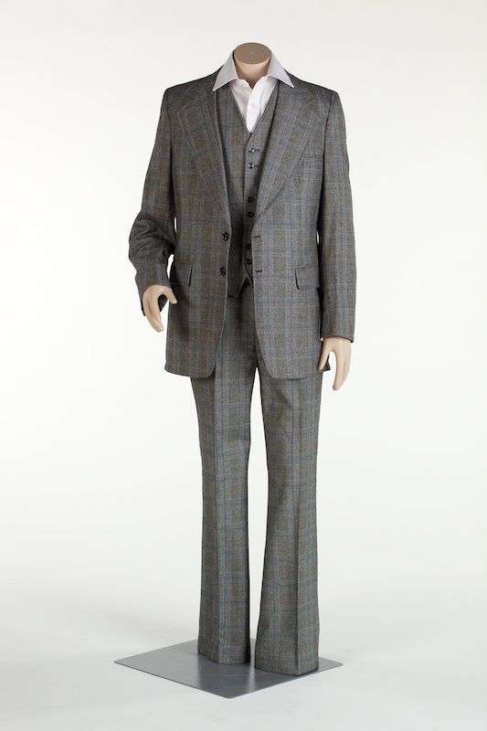 Blue, white and brown weaved suit.