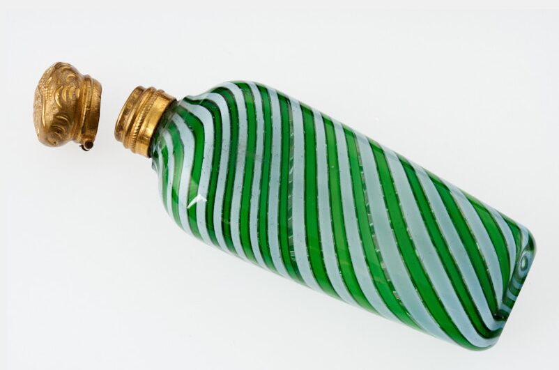 A green striped scent bottle