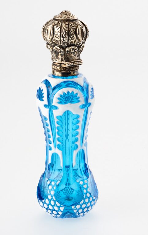 A blue and white scent bottle