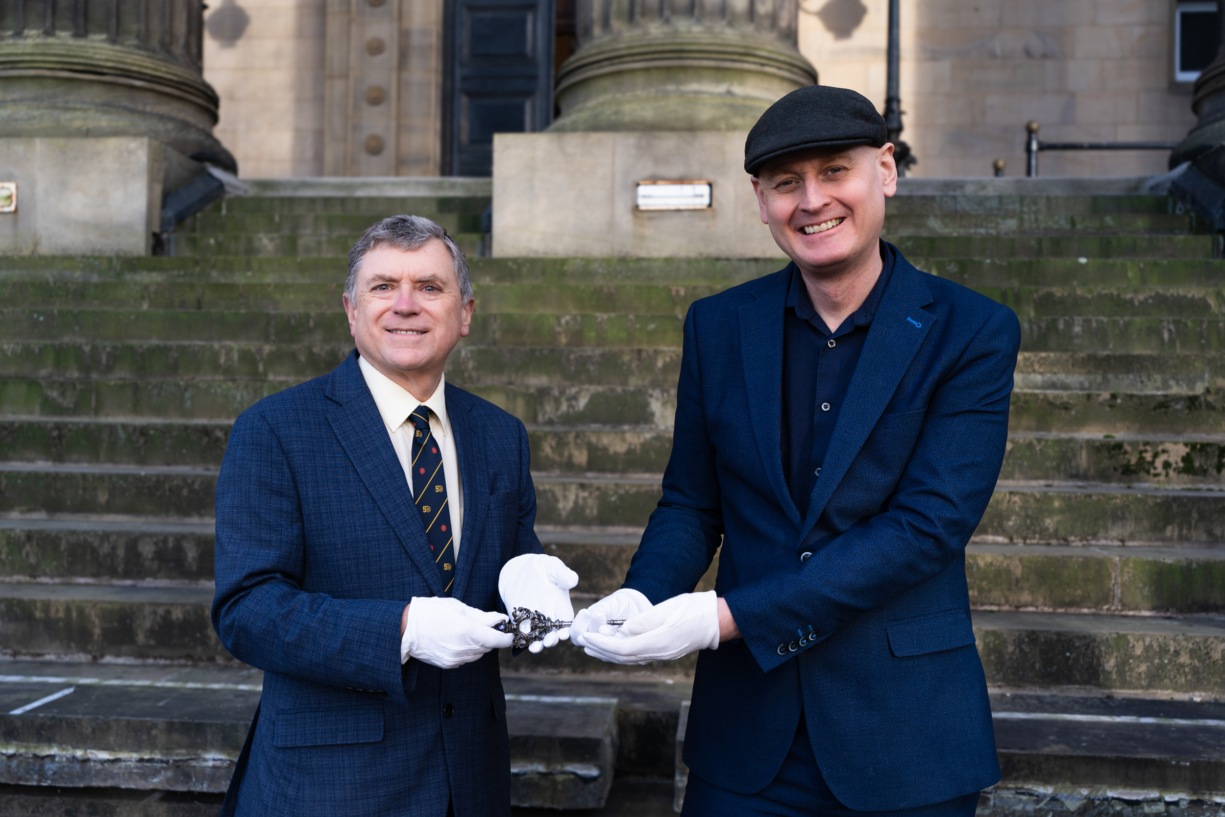 County Councillor Peter Buckley from Lancashire County Council holding the Ceremonial key with Councillor Matthew Brown from Preston City Council