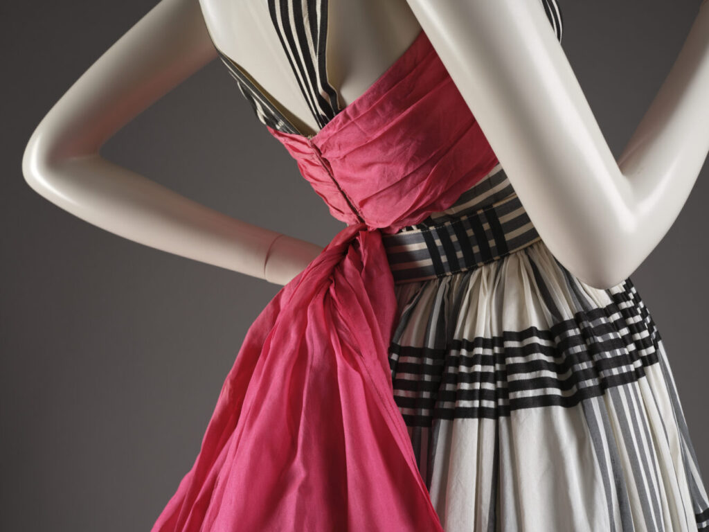 Black, white and pink evening dress made from Seker’s Nylon with belt and pink organza bow.