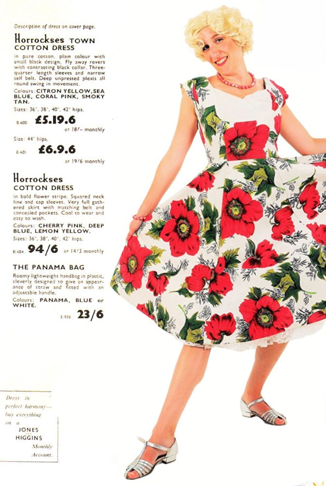 Image of a lady modeling a bright floral dress