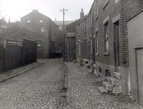 A black and white photograph of Rose Street in 1936