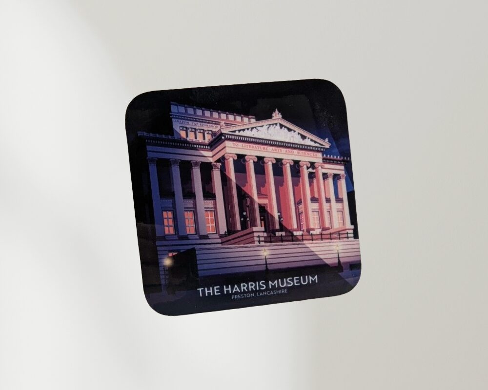 An illustrated art print depicting The Harris Museum, Art Gallery and Library at night. The neoclassical building is shown illuminated in pink and warm white light, with its grand columns, pediment and wide steps standing out against a dark, starry sky. Street lamps glow in the foreground, while dramatic shadows and lighting create a theatrical effect across the façade. The museum's inscription, "To Literature Arts and Sciences", is visible on the pediment above the columns.